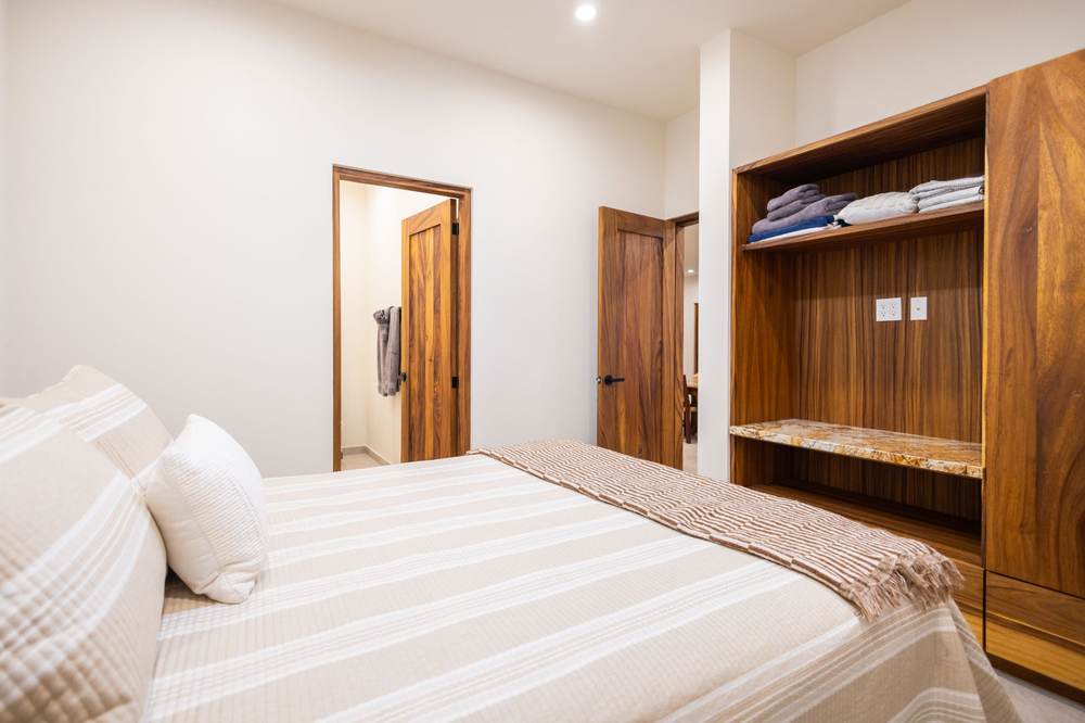 Bedroom with teak wardrobe